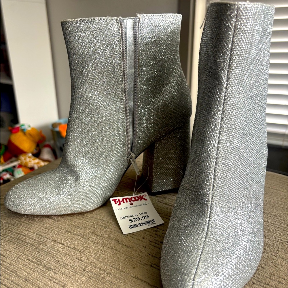 Brand new, never worn with tags on shiny boots